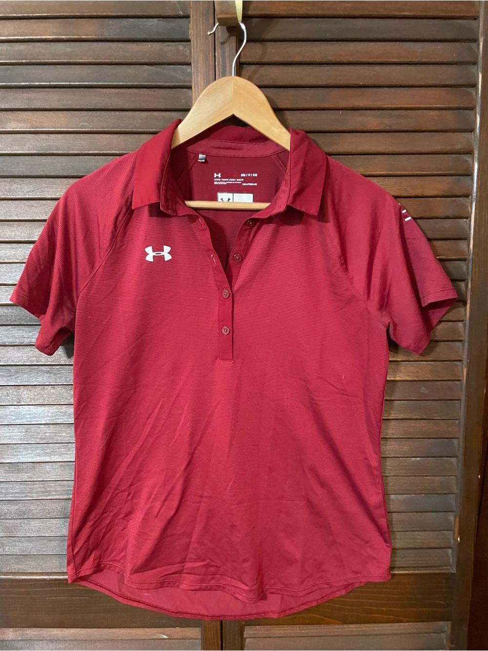 Woman’s Under Armour Women’s Maroon Polo Performance Top